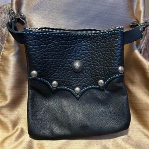 Leather purse w/sturdy clasps for riding bike. No straps!